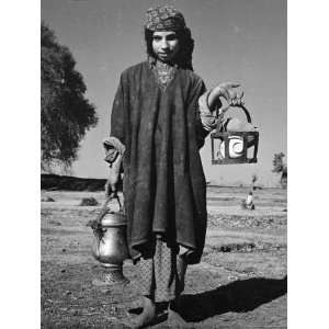  A Young Farm Girl Carries Salt Tea at Midday for Her 