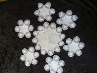 have for sale a lovely set of 7 pieces of Tenerife wheel lace, one 