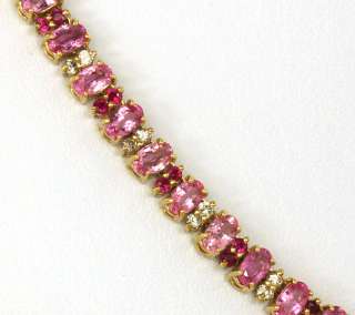 OPULENT 14K, 32 CTS PINK SAPPHIRES, 2.35 CTS RUBIES & 2 CTS DIAMONDS 