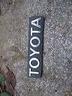 Toyota Truck Header Emblem 1980s OEM