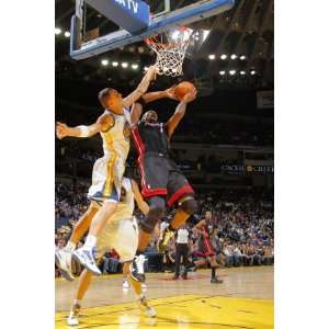 Miami Heat v Golden State Warriors Chris Bosh and Andris Biedrins 