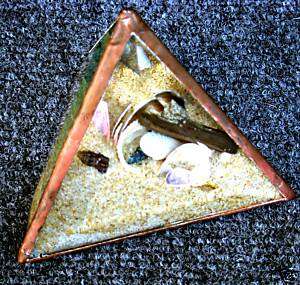 beveled glass triangular pyramid sand & sea shell scene  