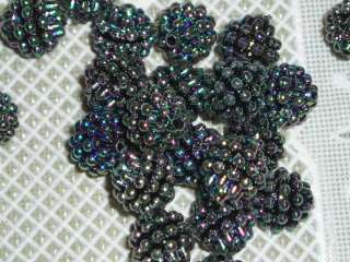 Adorable black mini aurora borealis berry beads with AB finish 