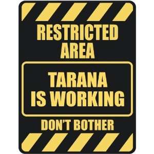   RESTRICTED AREA TARANA IS WORKING  PARKING SIGN