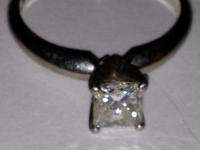 Ladys Platinum diamond engagement ring w/ .71 carat GIA princess cut 