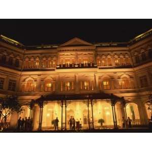 Facade of the Raffles Hotel at Night in Singapore, Southeast Asia 
