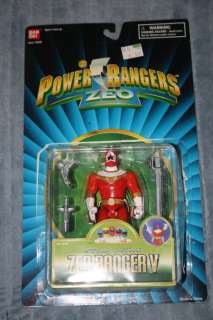   Rangers Zeo Gold, Red V, Green IV, and Blue III Zeo Rangers with boxes