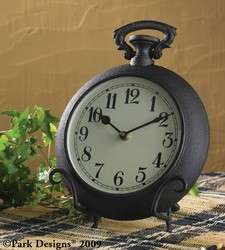 This is a new, in box, mantel or shelf clock, it is metal in the shape 