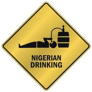   NIGERIAN DRINKING  CROSSING SIGN COUNTRY NIGERIA