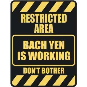  RESTRICTED AREA BACH YEN IS WORKING  PARKING SIGN