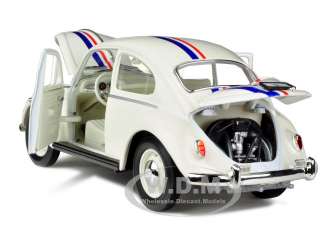   of 1967 volkswagen beetle custom cream die cast car model by road