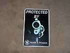 Smith & Wesson PROTECTED BY HOME SECURITY SIGN Glock Ruger Colt NEW 