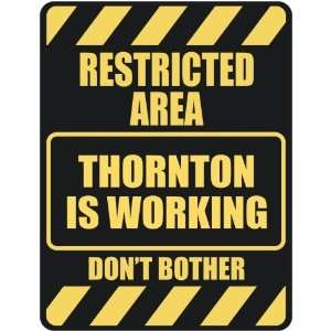   RESTRICTED AREA THORNTON IS WORKING  PARKING SIGN