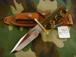   GRIP SHAPE AND BROWN SHEATH. CALL STEVE 612 382 0731 OR 952 884 7175