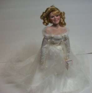 16 PORCELAIN DOLL BY THE ASHTON DRAKE GALLERIES FINISHING TOUCH IN 