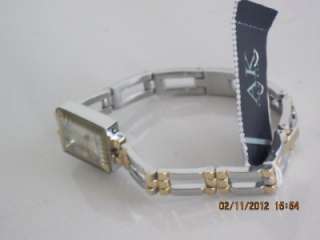 AK Anne Klein 10/4899SVTT Womens Two Tone Bangle Bracelet Silver Dial 