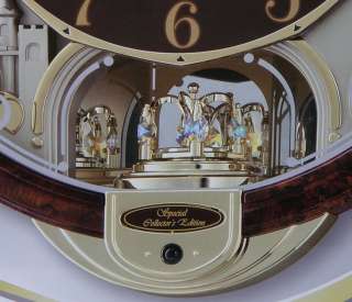   Christmas Melodies in Motion Musical Swarovski Crystal Wall Clock