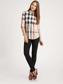 Collar style Button closure Long sleeves About 23 from shoulder to 