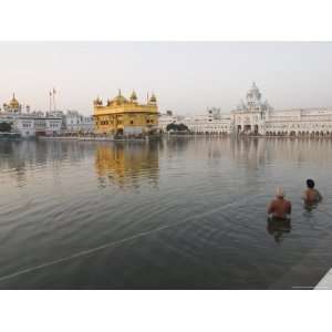  Two Sikh Pilgrims Bathing and Praying in the Early Morning 