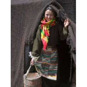  Tibetan Woman Carrying a Bucket to the Tent, East 